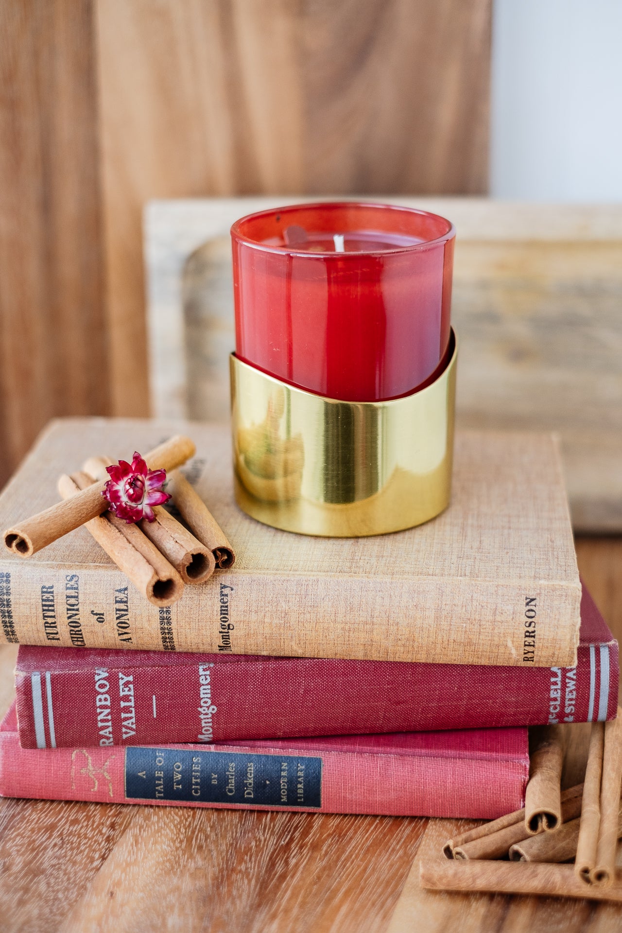 Thymes Simmered Cider Candle with Gold Sleeve.